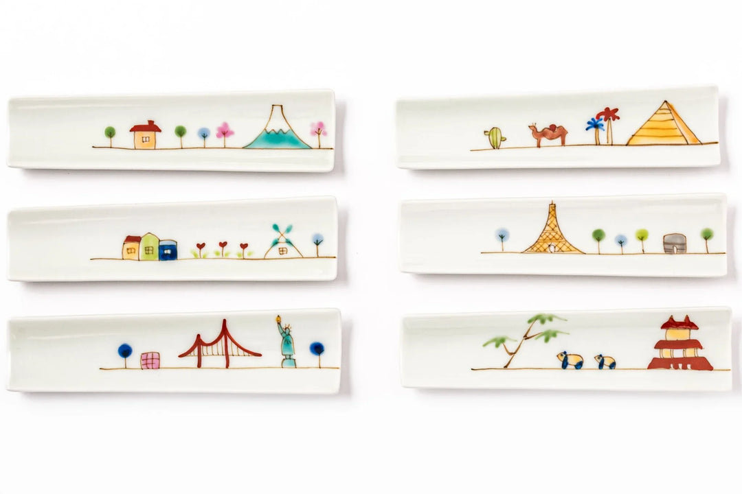 Colorful porcelain chopstick rests featuring charming hand-painted world landmarks and scenes.
