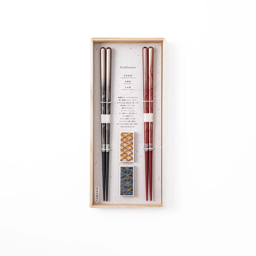 Elegant Bloom Japanese chopsticks gift set inside a traditional wooden box featuring two pairs of chopsticks and matching rests