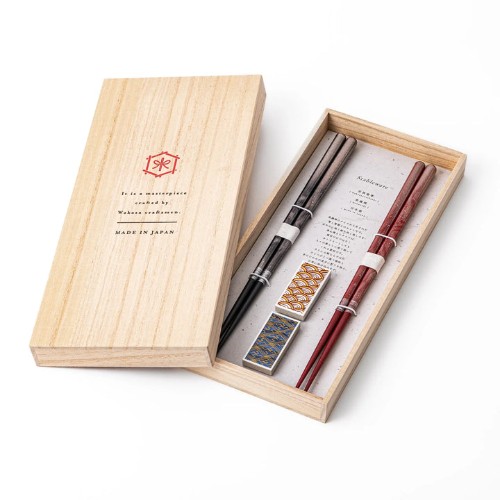Elegant Bloom Japanese chopsticks gift set inside a traditional wooden box featuring two pairs of chopsticks and matching rests