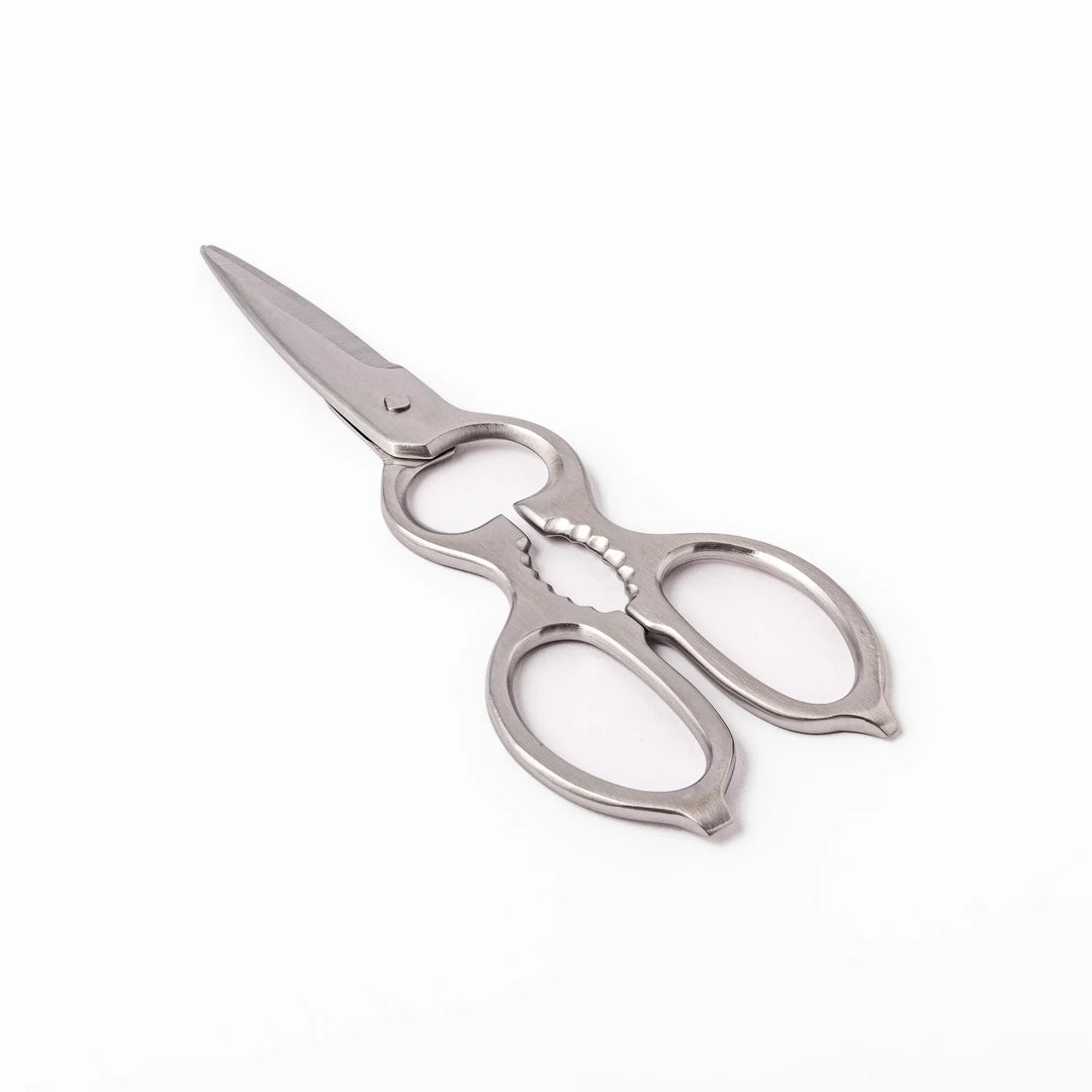 Japanese stainless steel kitchen shears with sharp blades and grip for cutting meat seafood and vegetables.