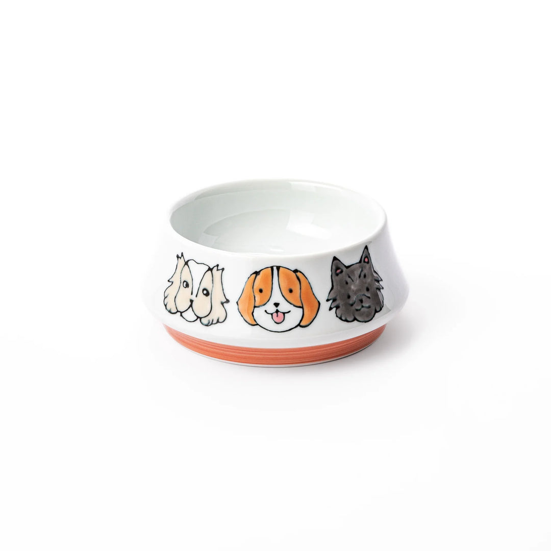 Japanese ceramic dog bowl with hand painted dog face designs and raised rim for pets