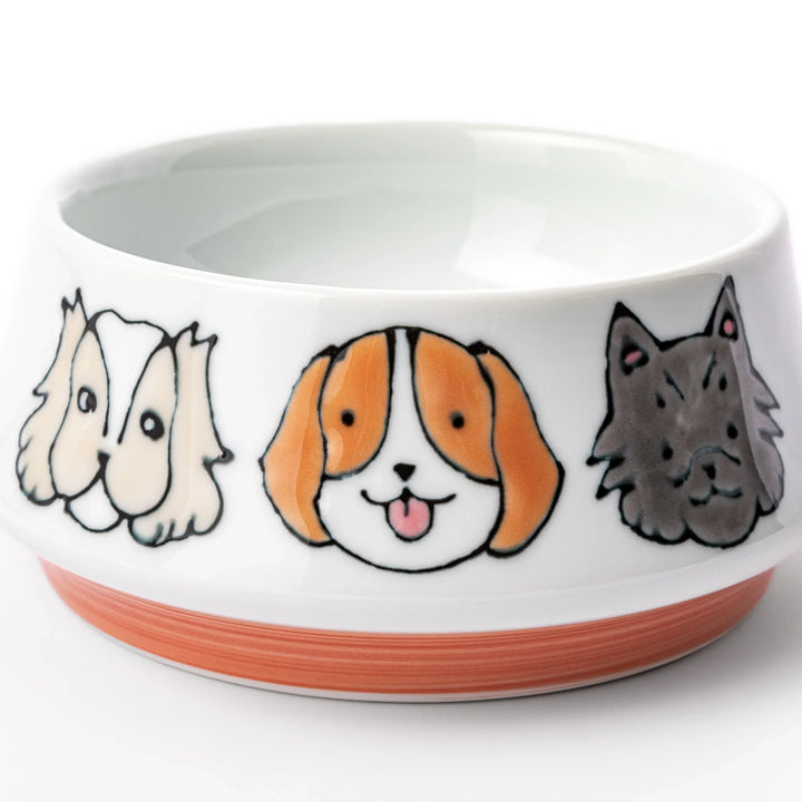 Japanese ceramic dog bowl with hand painted dog face designs and raised rim for pets