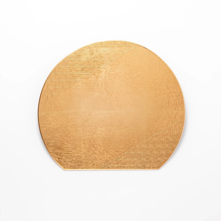Japanese round gold placemat with subtle Asanoha hemp leaf pattern adding an elegant accent to contemporary dining tables.