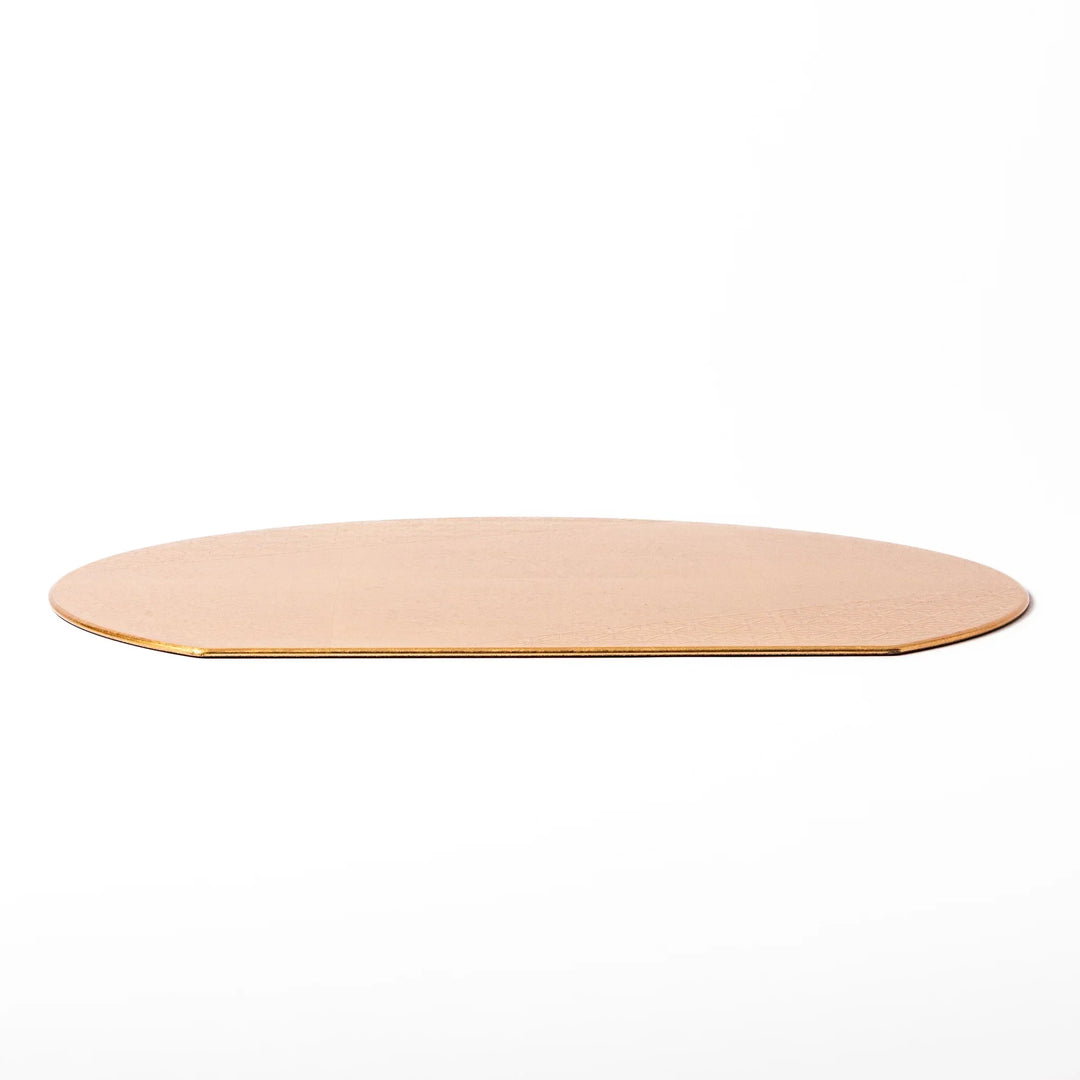 Gold Japanese Asanoha hemp leaf placemat with semicircular shape and embossed pattern for elegant table.