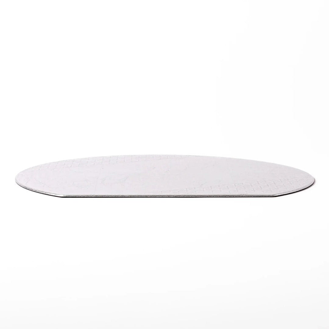 Silver Japanese Asanoha hemp leaf placemat with semicircular shape and embossed pattern for refined table.