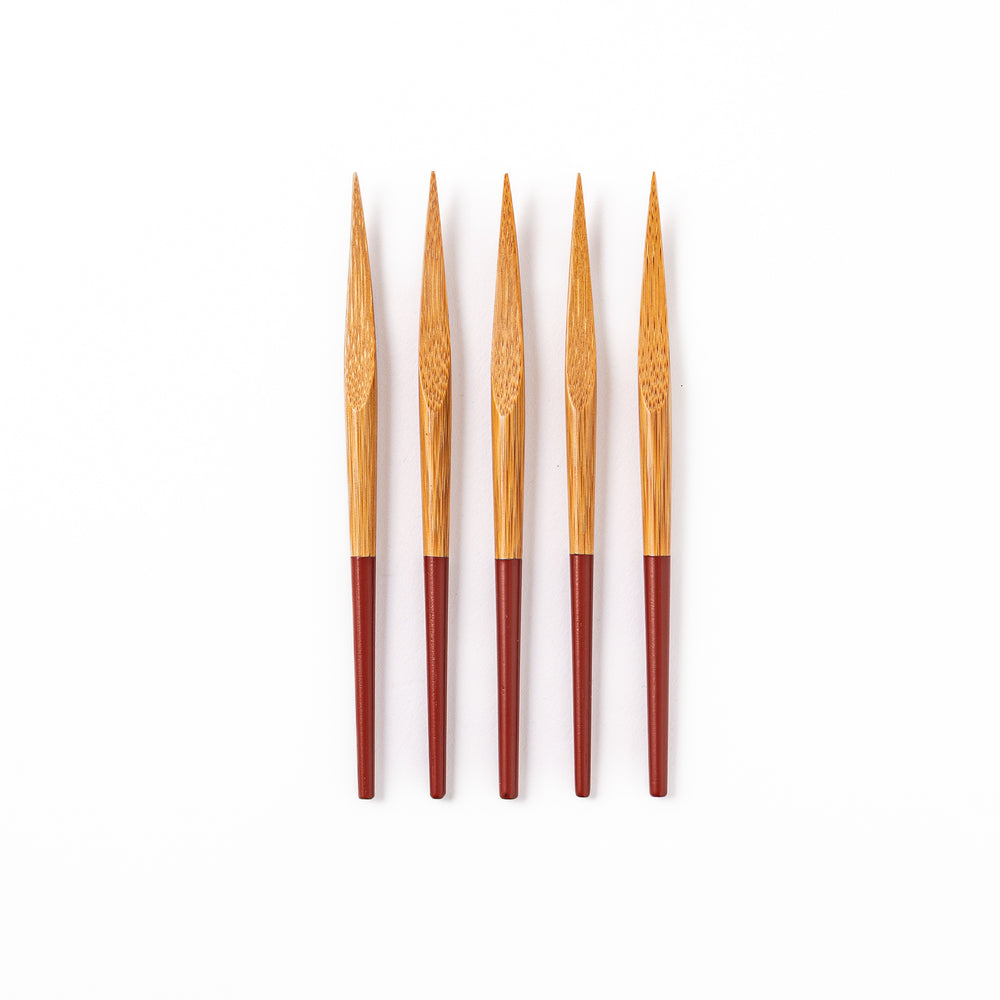 Set of five Japanese bamboo cocktail forks with red handles and a natural bamboo finish for appetizers and desserts