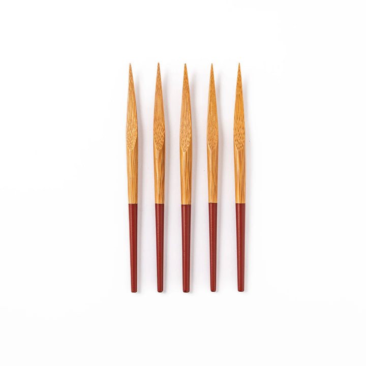 Set of five Japanese bamboo cocktail forks with red handles and a natural bamboo finish for appetizers and desserts