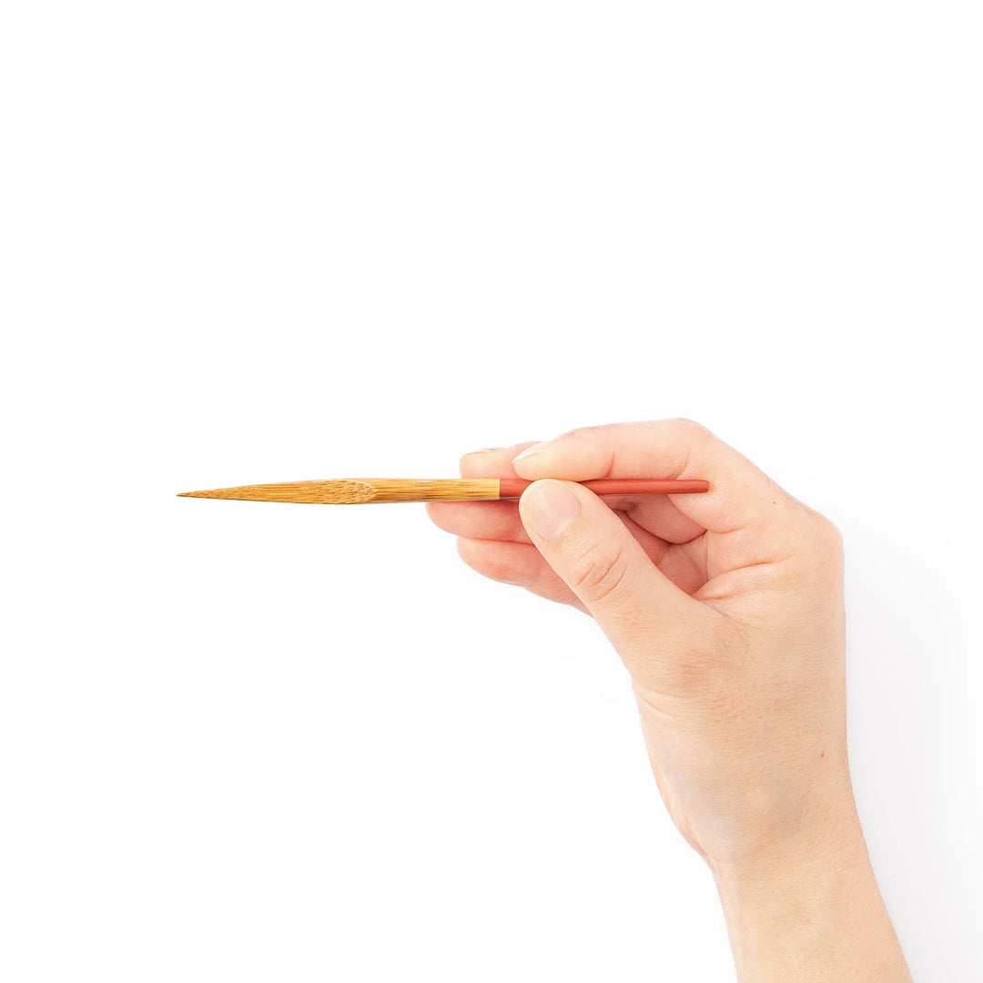 Set of five Japanese bamboo cocktail forks with red handles and a natural bamboo finish for appetizers and desserts