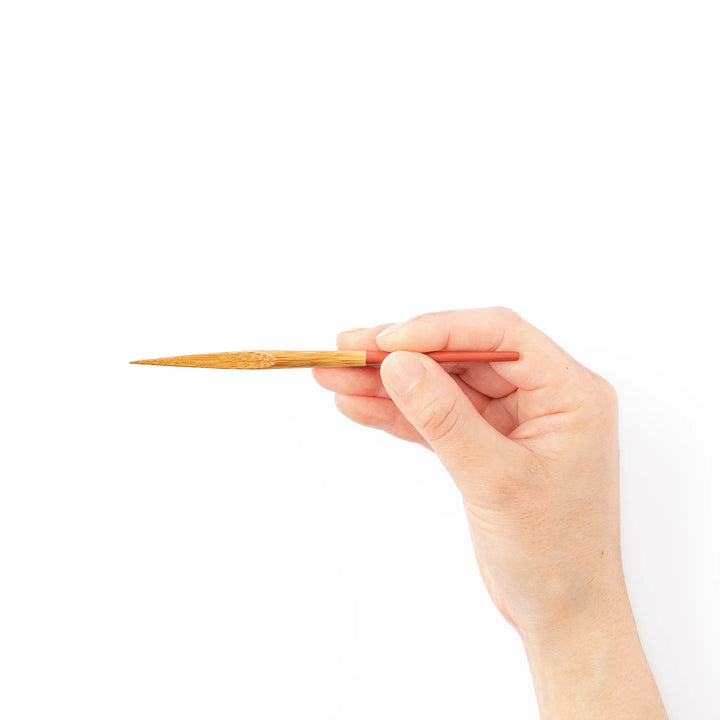Set of five Japanese bamboo cocktail forks with red handles and a natural bamboo finish for appetizers and desserts