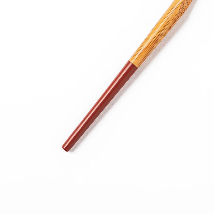 Set of five Japanese bamboo cocktail forks with red handles and a natural bamboo finish for appetizers and desserts