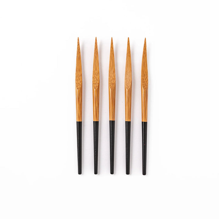 Set of five Japanese bamboo cocktail forks with black handles and a natural bamboo finish for appetizers and desserts