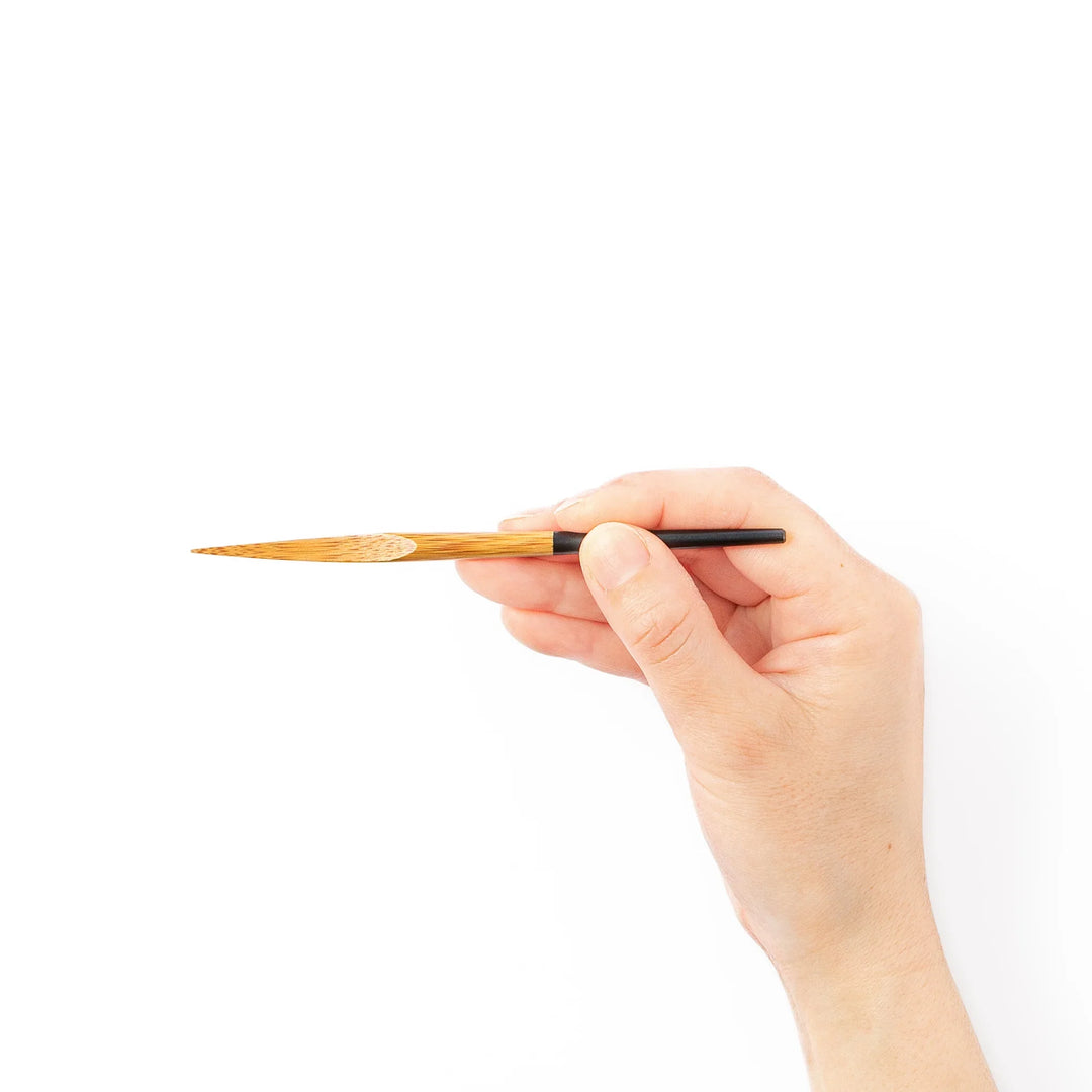Set of five Japanese bamboo cocktail forks with black handles and a natural bamboo finish for appetizers and desserts