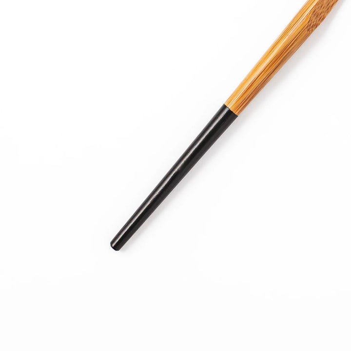 Set of five Japanese bamboo cocktail forks with black handles and a natural bamboo finish for appetizers and desserts