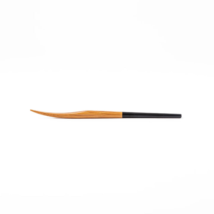 Set of five Japanese bamboo cocktail forks with black handles and a natural bamboo finish for appetizers and desserts