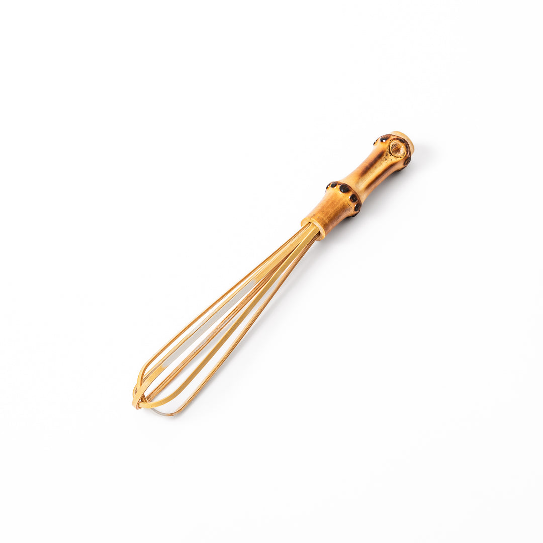 Japanese bamboo mini whisk with a natural root handle for whipping small portions of dressings or matcha