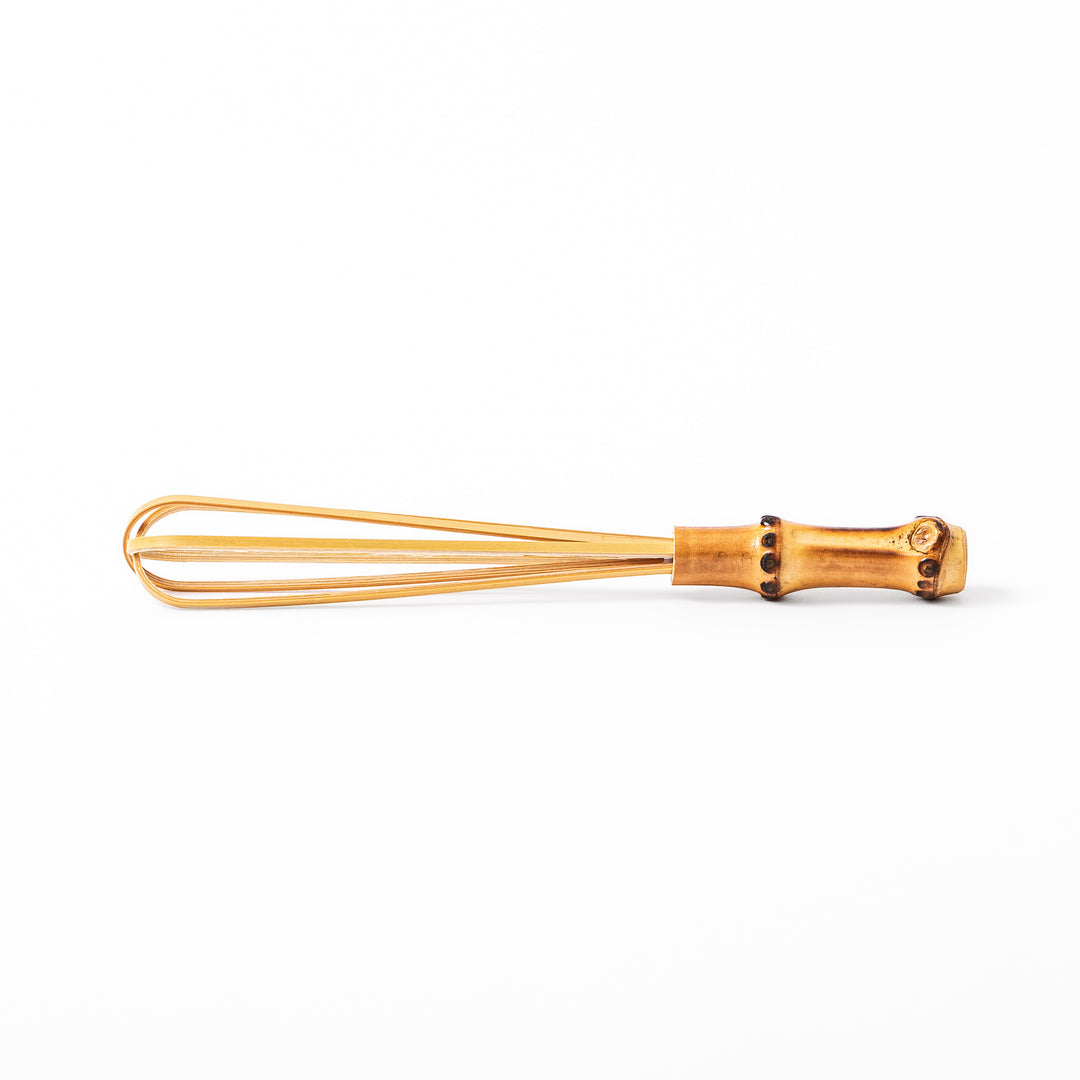 Japanese bamboo mini whisk with a natural root handle for whipping small portions of dressings or matcha