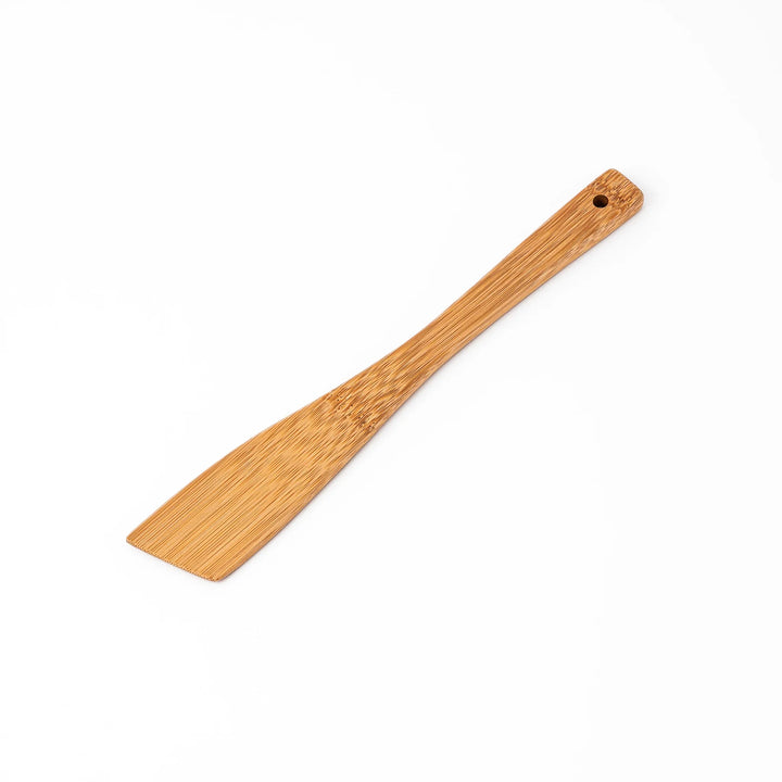 Handcrafted Japanese bamboo spatula for rice and pilaf featuring a natural bamboo finish and a convenient hanging hole