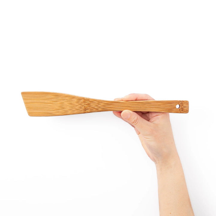 Handcrafted Japanese bamboo spatula for rice and pilaf featuring a natural bamboo finish and a convenient hanging hole