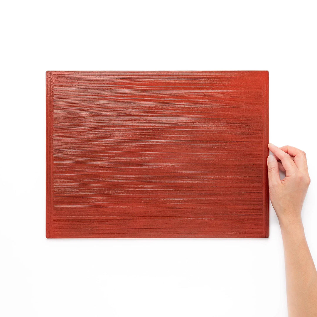 Reversible Japanese lacquer tray with red and black brush finish for elegant versatile serving use.