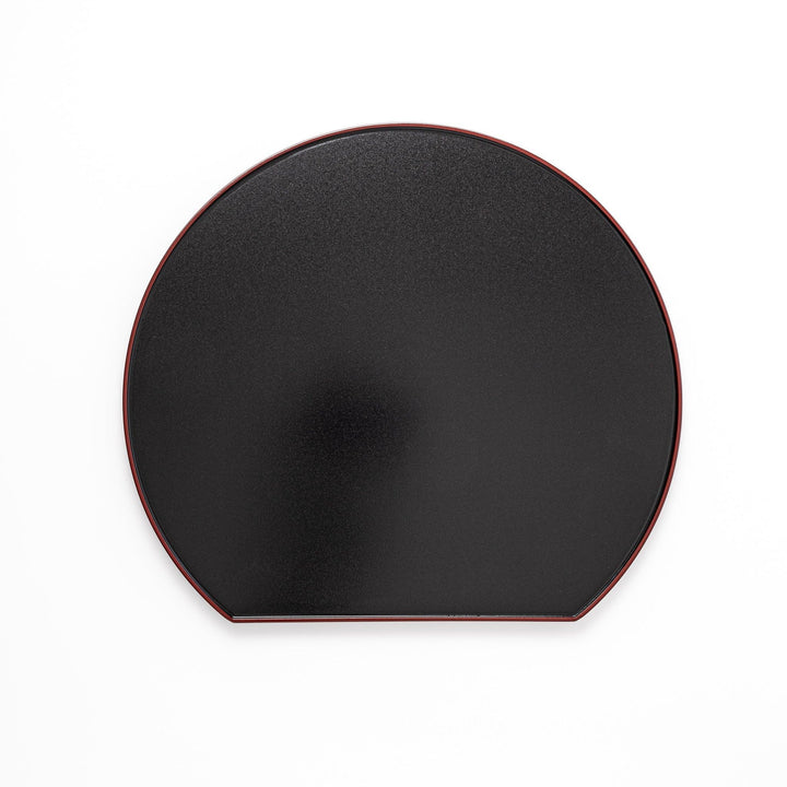 Reversible Japanese half moon lacquer tray in red and black for minimalist and modern dining presentation.