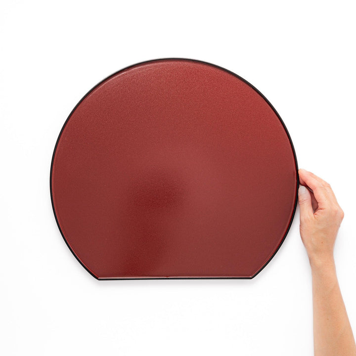Reversible Japanese half moon lacquer tray in red and black for minimalist and modern dining presentation.