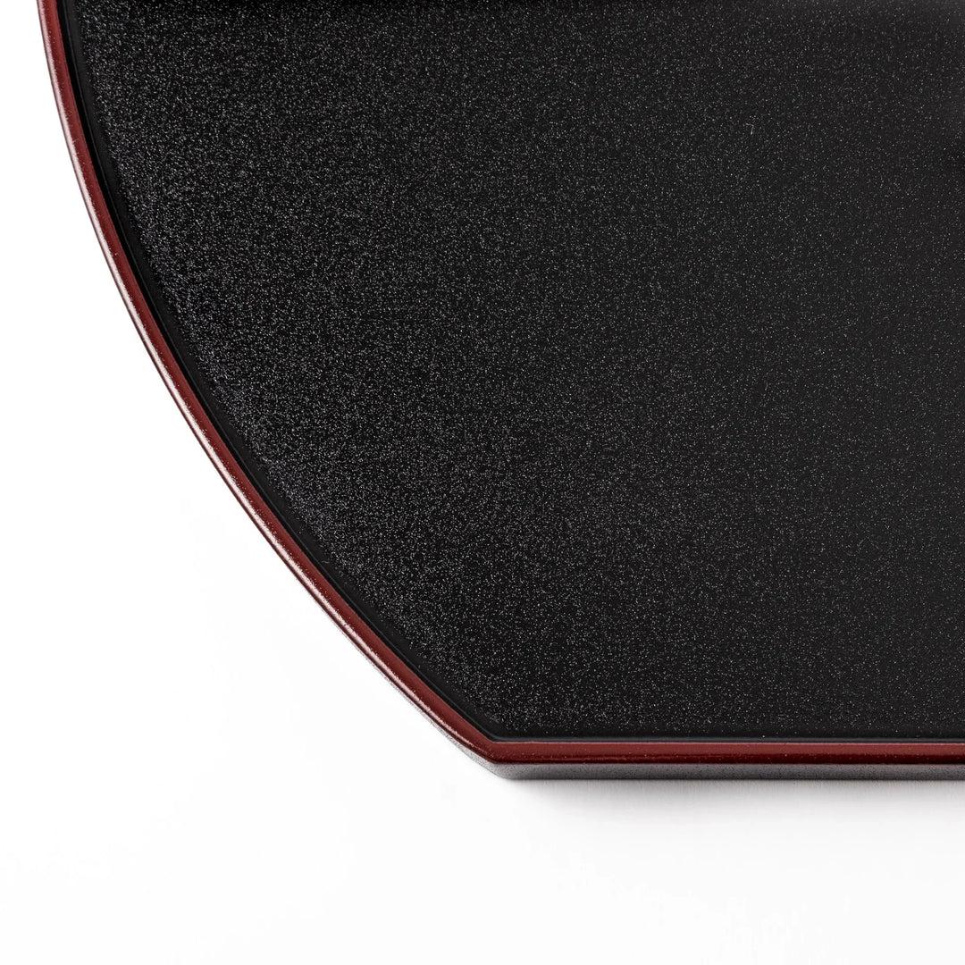 Reversible Japanese half moon lacquer tray in red and black for minimalist and modern dining presentation.