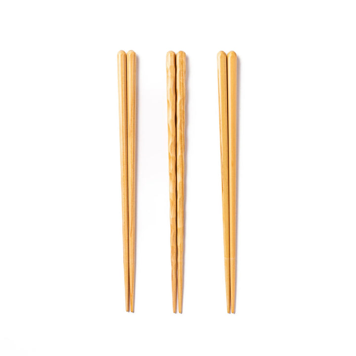 Japanese Hinoki wood chopsticks in octagonal, carved, and rounded corner shapes, showcasing natural wooden texture.