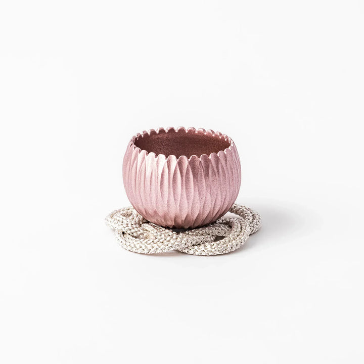 Pink Japanese hydrangea mini prayer bowl with petal texture gold striker and silver knot cushion for ritual.