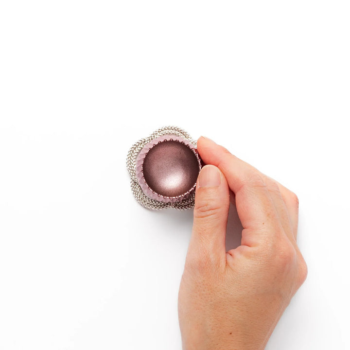 Pink Japanese hydrangea mini prayer bowl with petal texture gold striker and silver knot cushion for ritual.