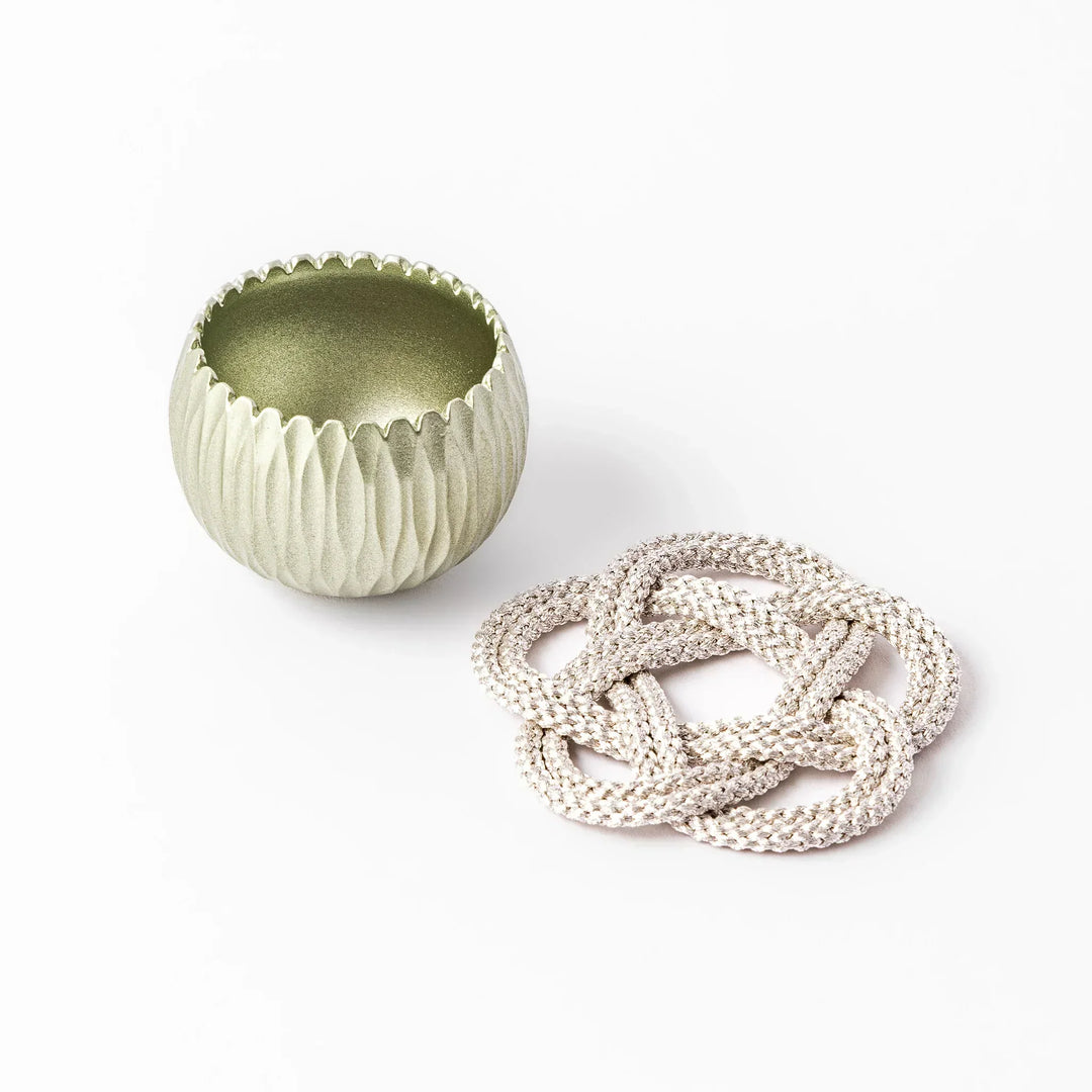 Lime green Japanese hydrangea mini prayer bowl with petal texture gold striker and silver knot cushion.