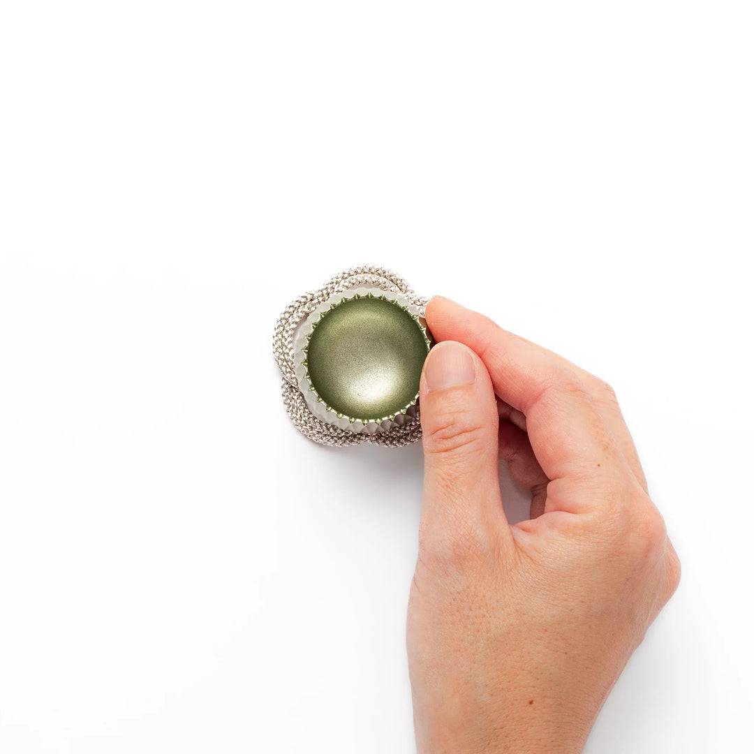 Lime green Japanese hydrangea mini prayer bowl with petal texture gold striker and silver knot cushion.