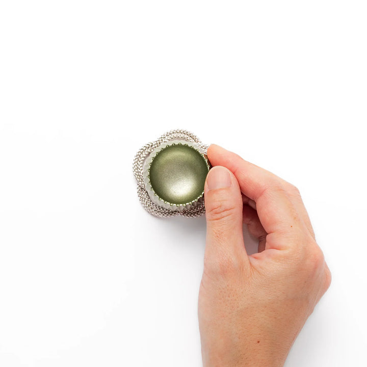 Lime green Japanese hydrangea mini prayer bowl with petal texture gold striker and silver knot cushion.