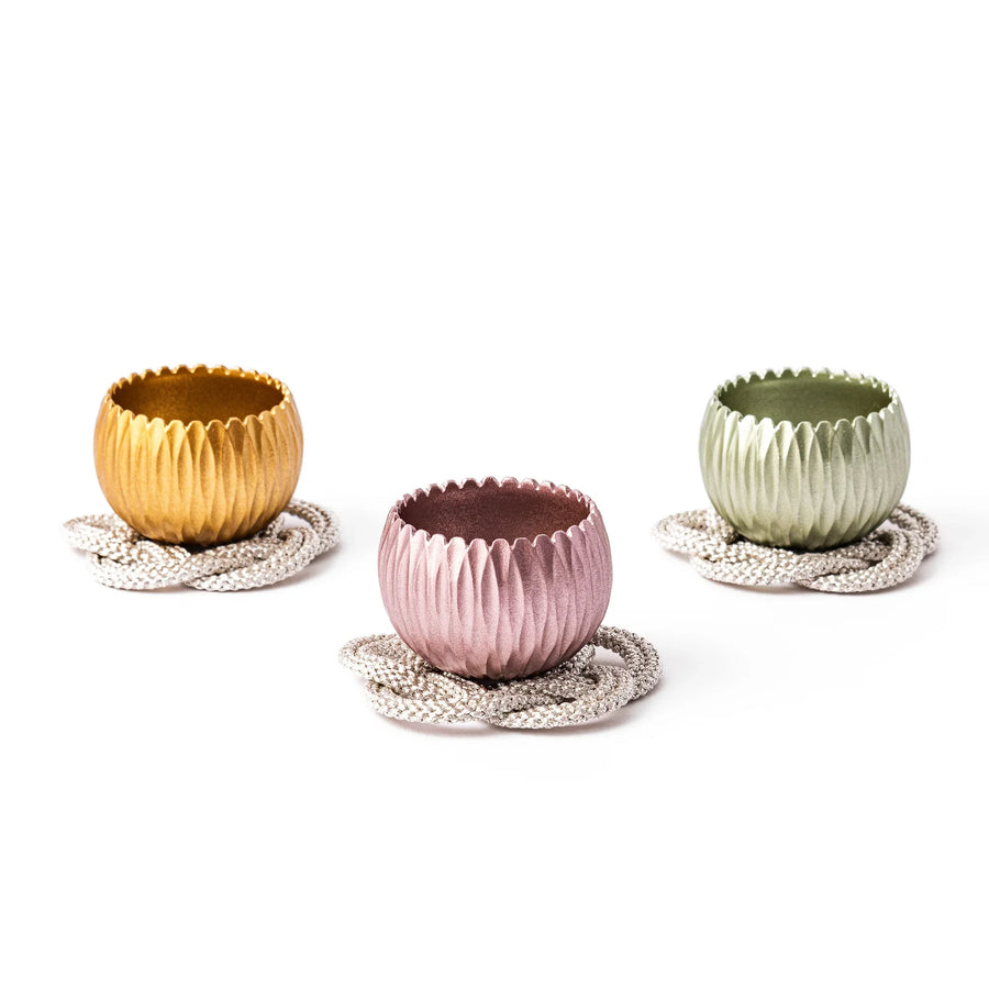 Set of three Japanese hydrangea mini prayer bowls in pink yellow and lime green with petal design cushion.