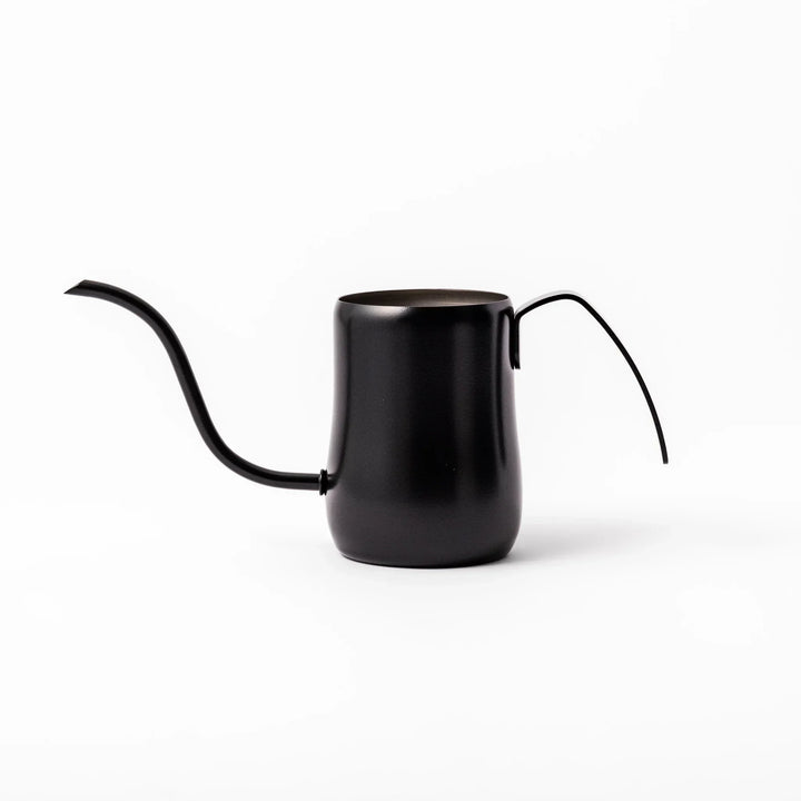 Japanese matte black pour kettle with gooseneck spout and ergonomic handle for precise coffee brewing.