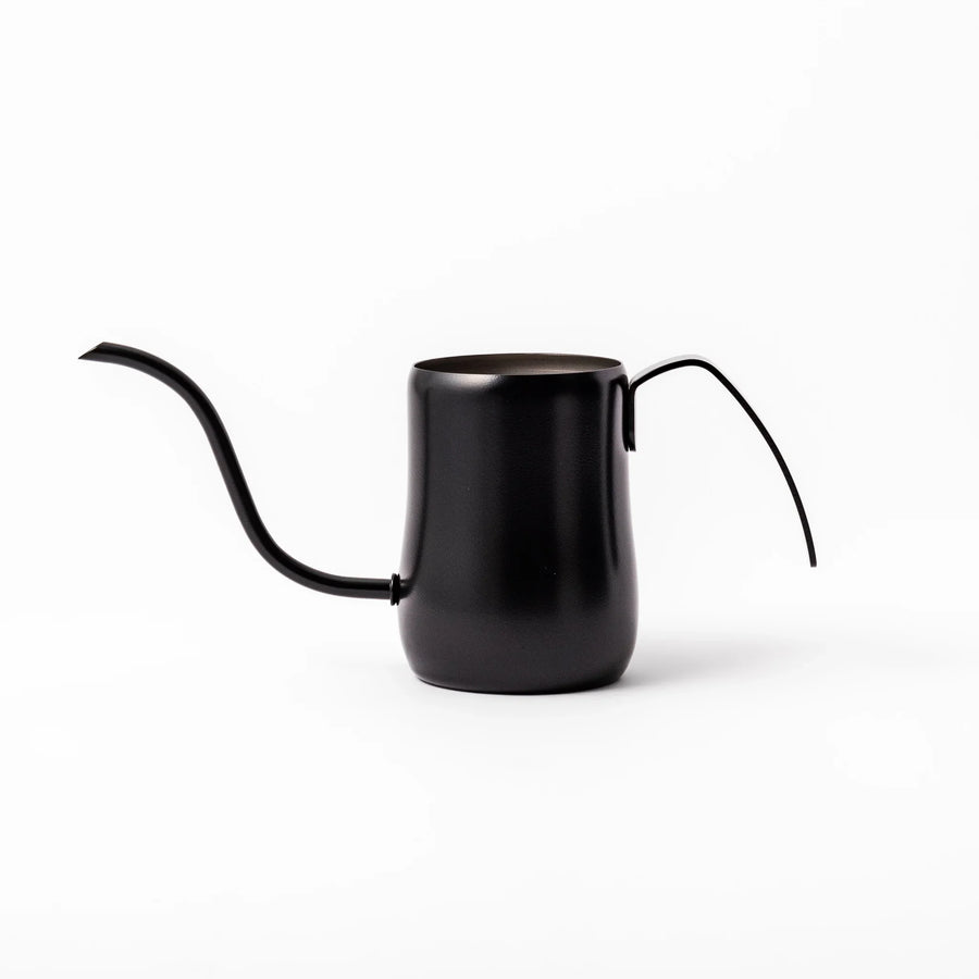 Japanese matte black pour kettle with gooseneck spout and ergonomic handle for precise coffee brewing.