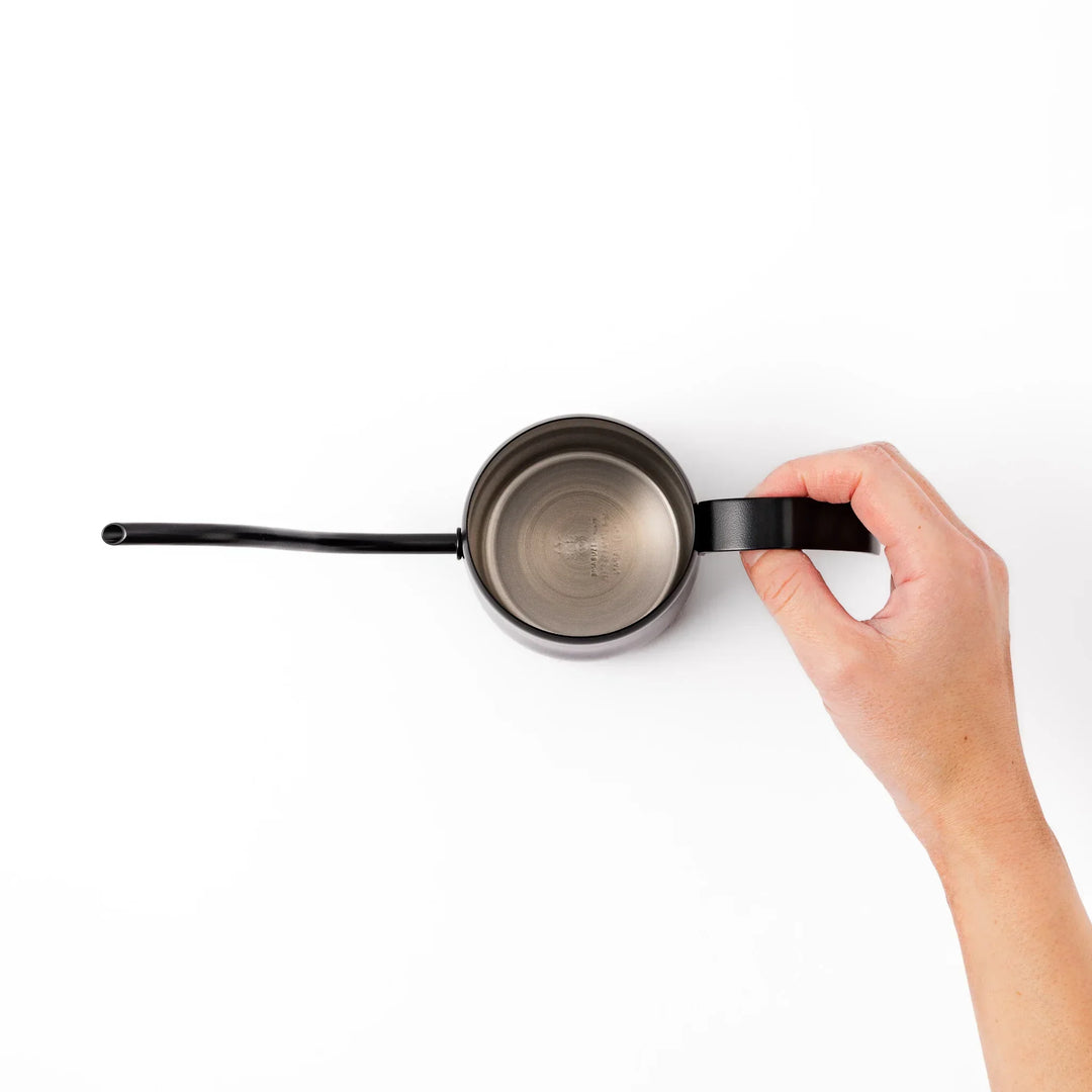 Japanese matte black precision pour kettle with a slender gooseneck spout and ergonomic handle, designed for controlled water flow in pour-over coffee brewing.