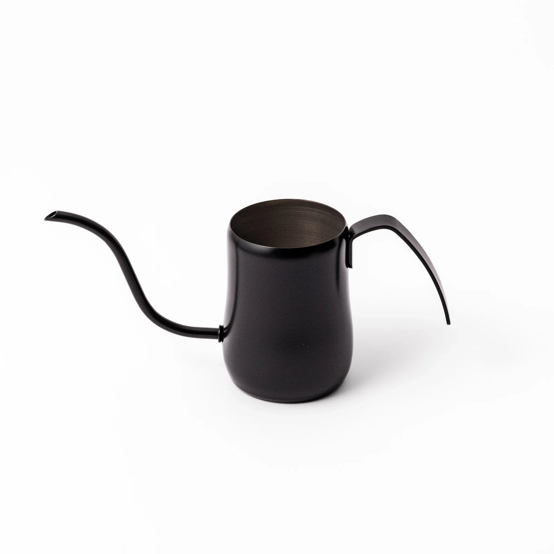 Japanese matte black pour kettle with gooseneck spout and ergonomic handle for precise coffee brewing.