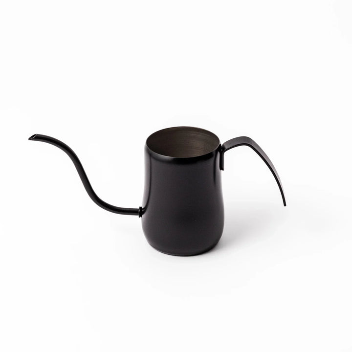 Japanese matte black pour kettle with gooseneck spout and ergonomic handle for precise coffee brewing.