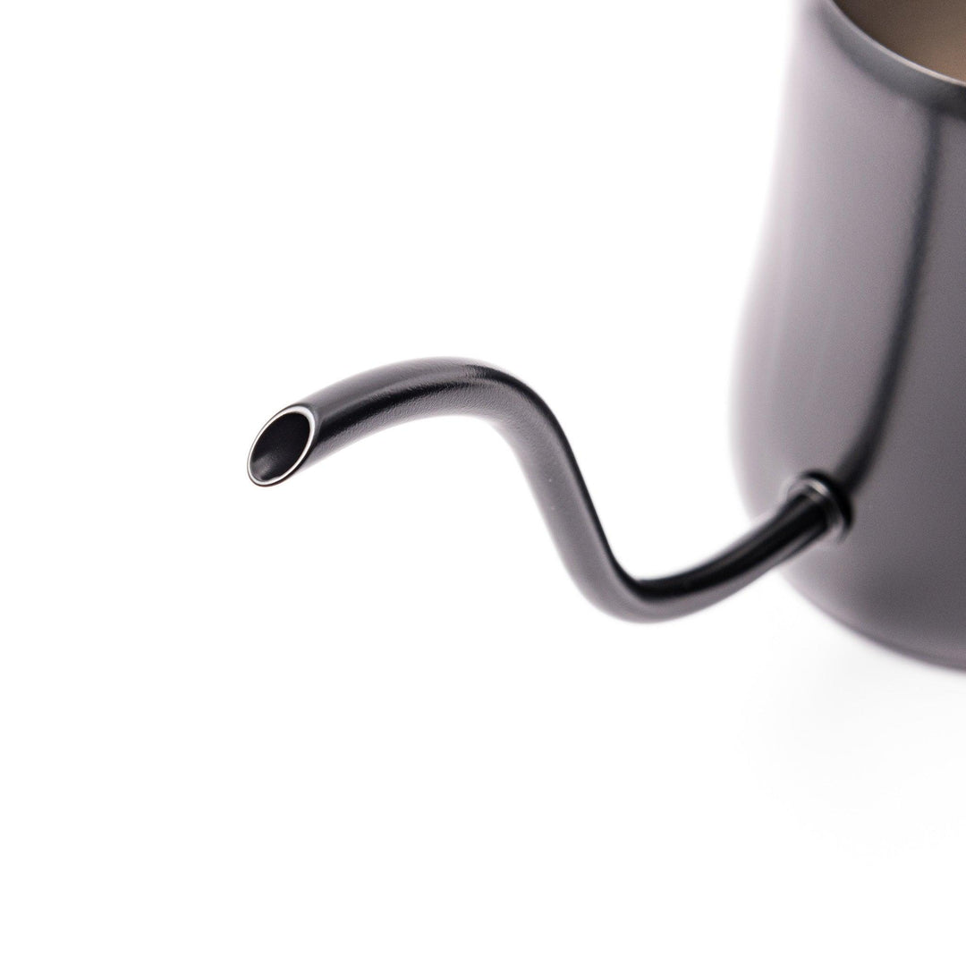 Japanese matte black pour kettle with gooseneck spout and ergonomic handle for precise coffee brewing.