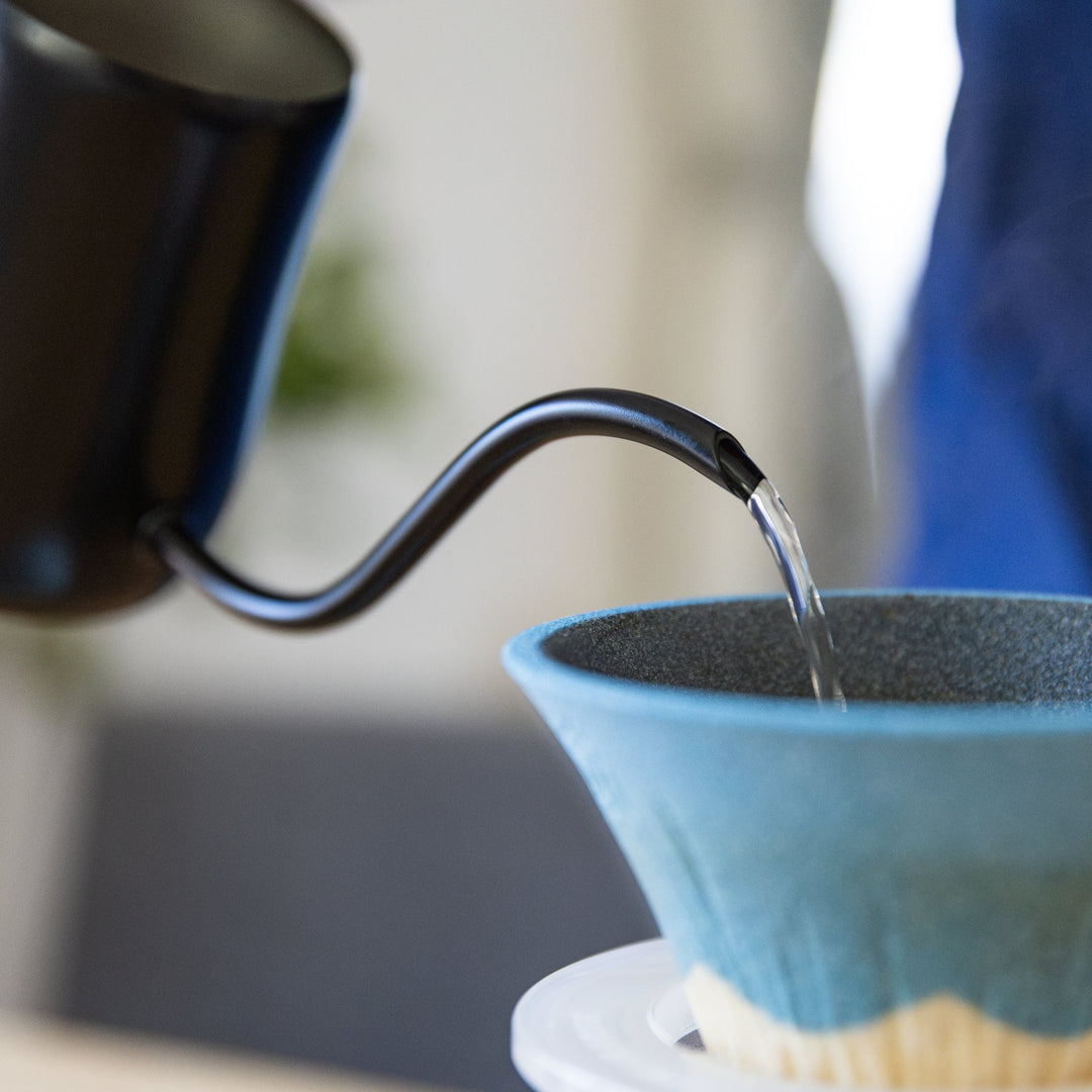 Matte Black Precision Pour Kettle with slim gooseneck spout pouring hot water for pour over coffee