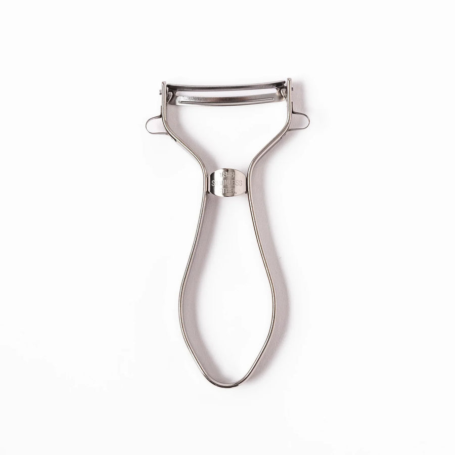 Japanese stainless steel peeler with sharp swivel blade and ergonomic handle for easy daily vegetable prep.
