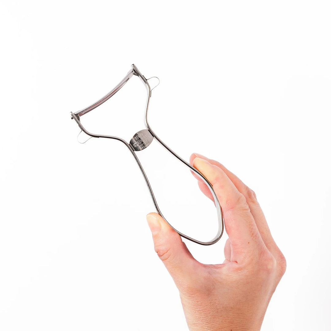 Japanese stainless steel peeler with sharp swivel blade and ergonomic handle for easy daily vegetable prep.