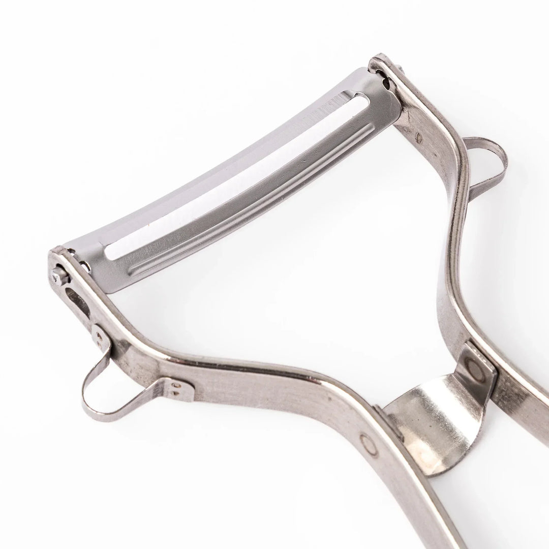 Japanese stainless steel peeler with sharp swivel blade and ergonomic handle for easy daily vegetable prep.