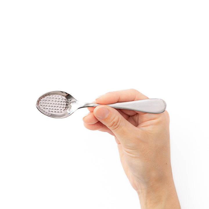 Japanese stainless steel strawberry spoon features flat embossed bottom for mashing fresh fruit easily