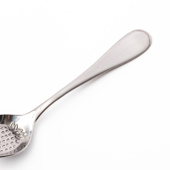 Japanese stainless steel strawberry spoon features flat embossed bottom for mashing fresh fruit easily
