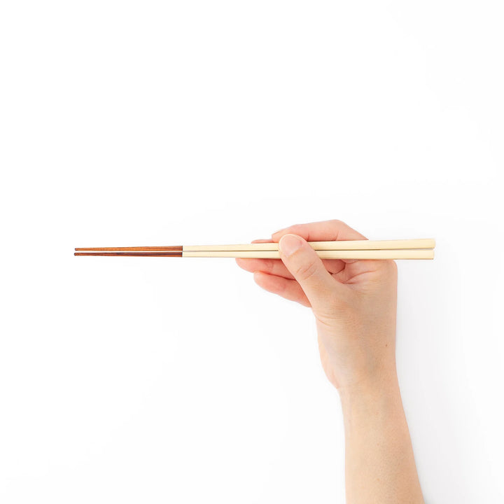 Pair of natural white Japanese traditional color bamboo chopsticks with fine tips for an elegant and precise dining experience