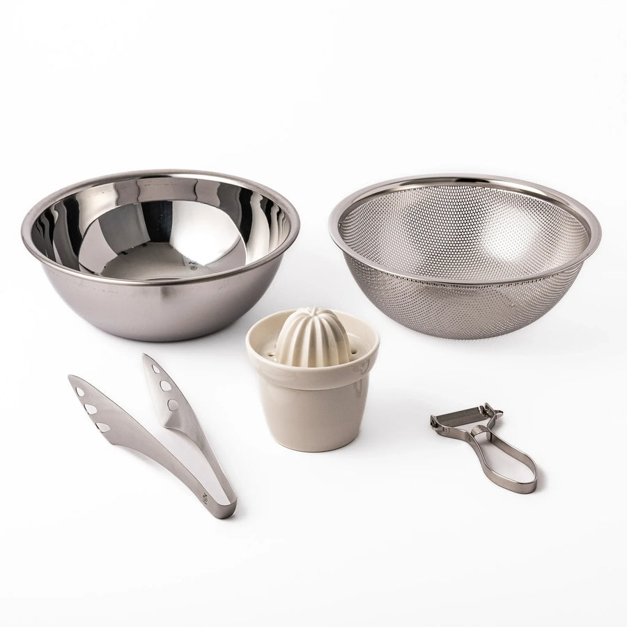 Japanese salad prep set with stainless bowls colander and utensils designed for efficient meal preparation.