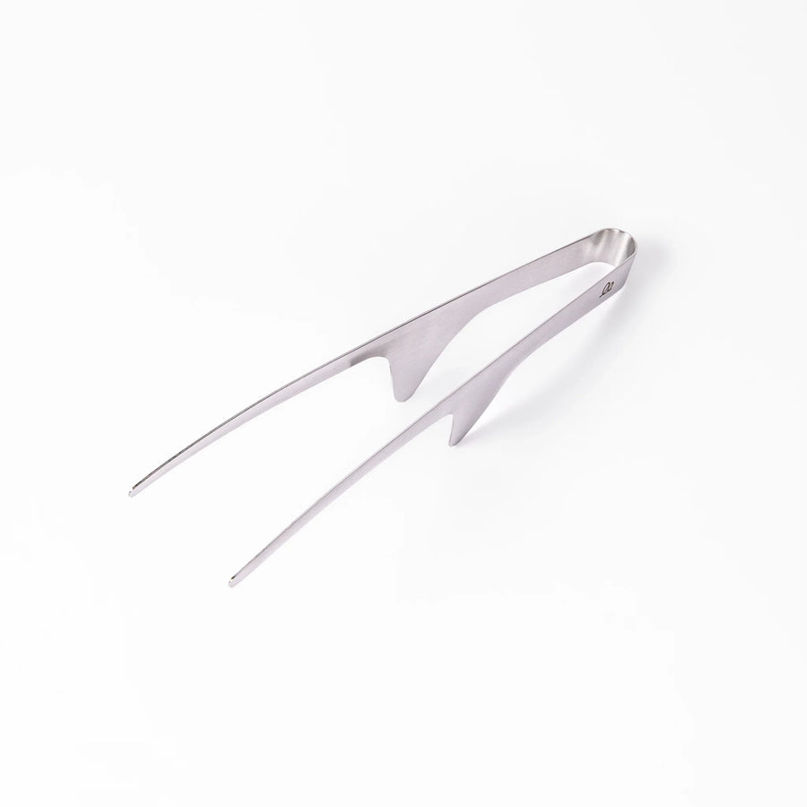 Japanese stainless steel precision tongs with long narrow tips for delicate food handling and plating
