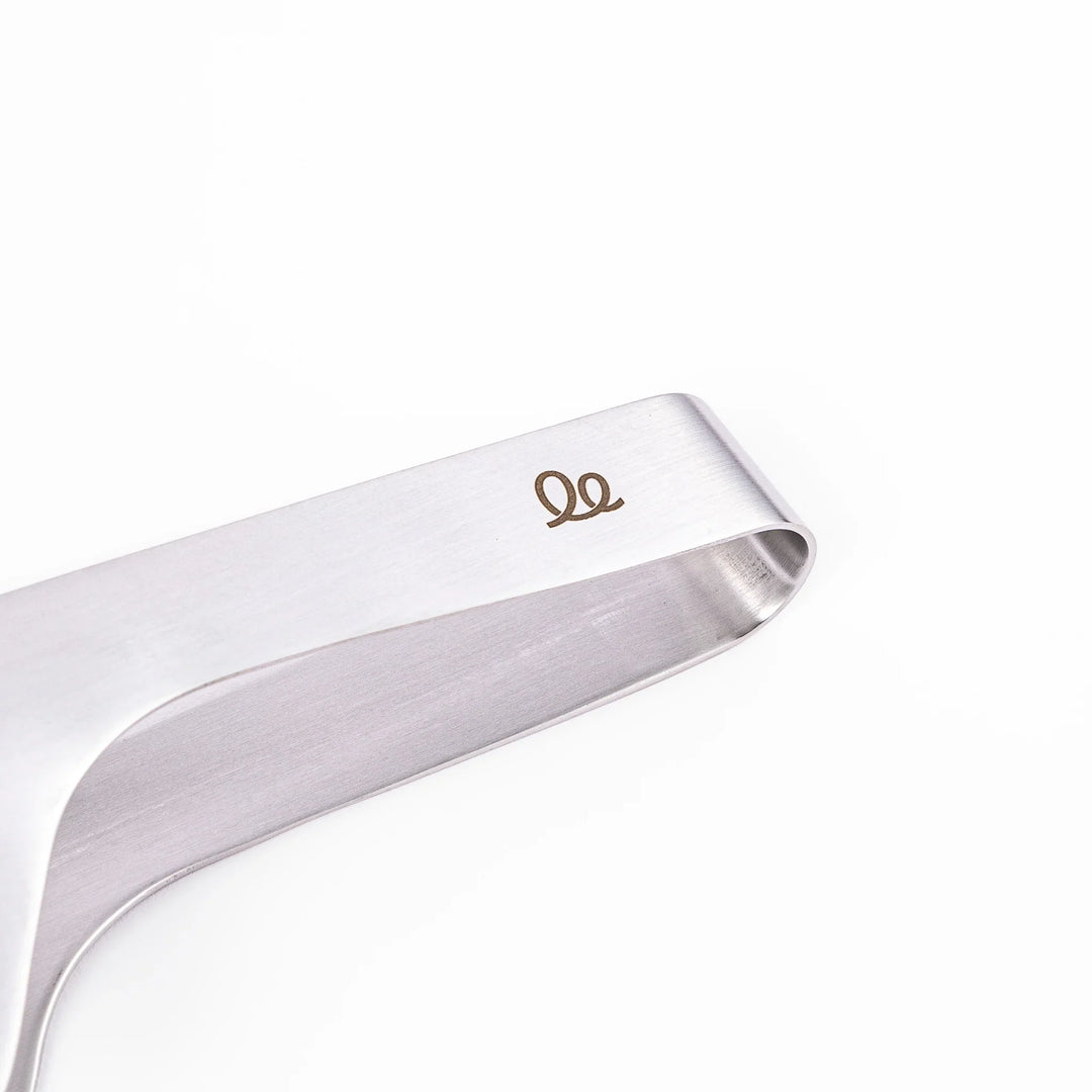 Japanese stainless steel precision tongs with long narrow tips for delicate food handling and plating