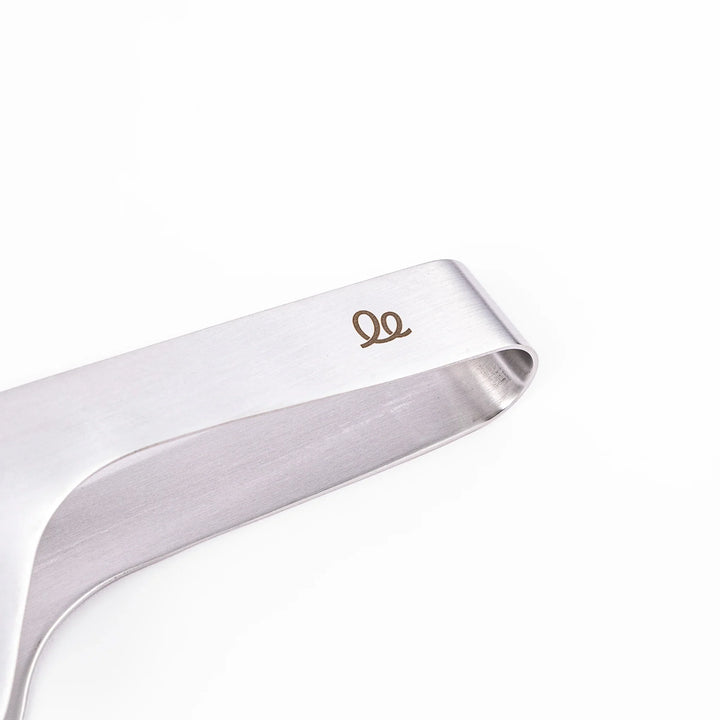 Japanese stainless steel precision tongs with long narrow tips for delicate food handling and plating